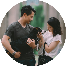 Image of a couple and their dog